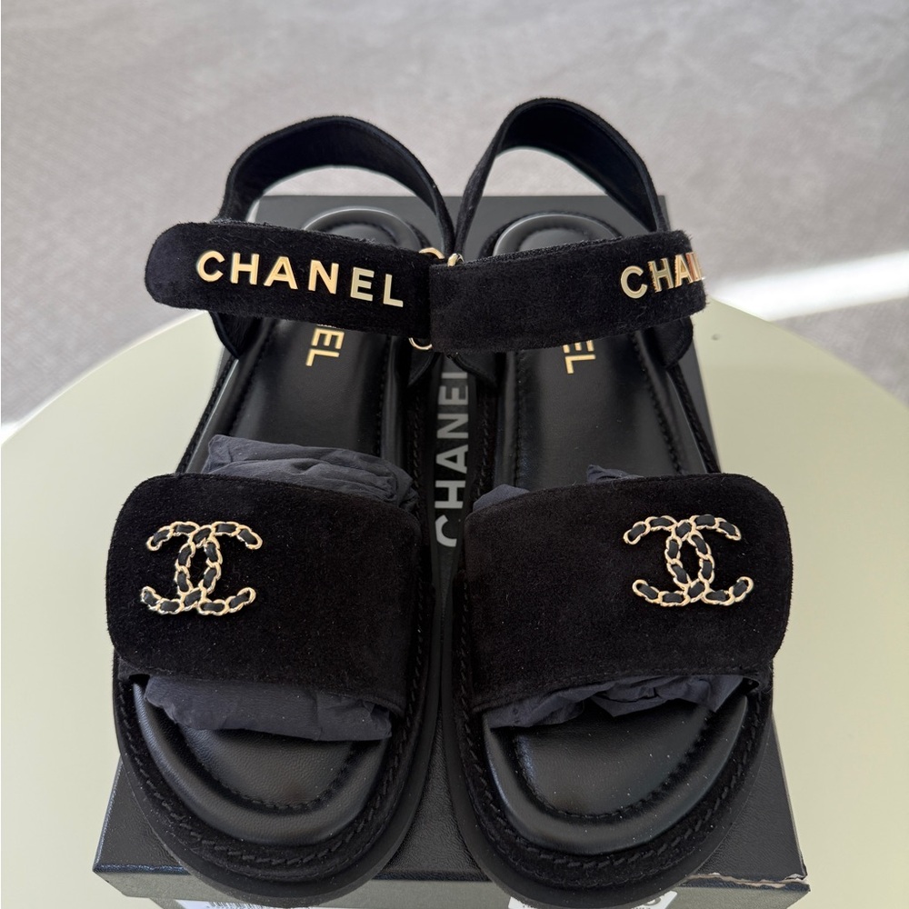 CHANEL Black Sandals with Gold Accents